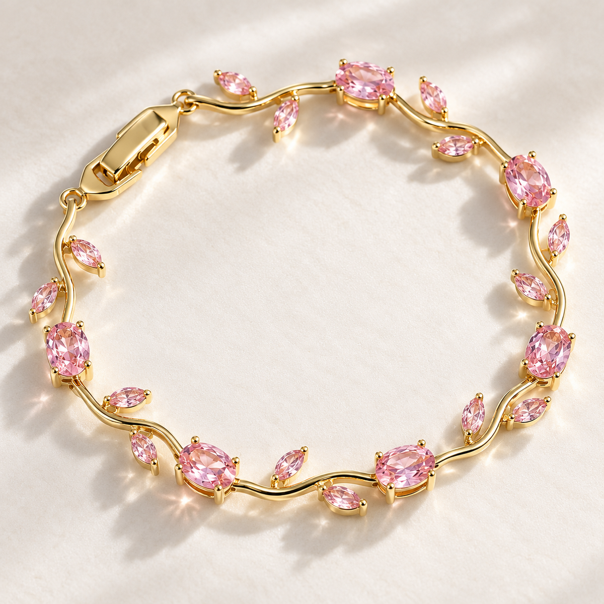 Dainty Rose Bracelet with pink stones and an 18K gold-over-brass vine design