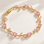 Dainty Rose Bracelet with pink stones and an 18K gold-over-brass vine design