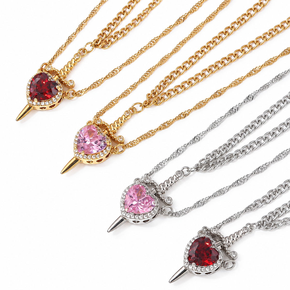 Love & Valor Necklace in gold and silver tones with pink and red hearts