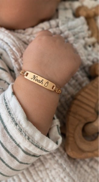 Baby wearing Noah personalized bracelet