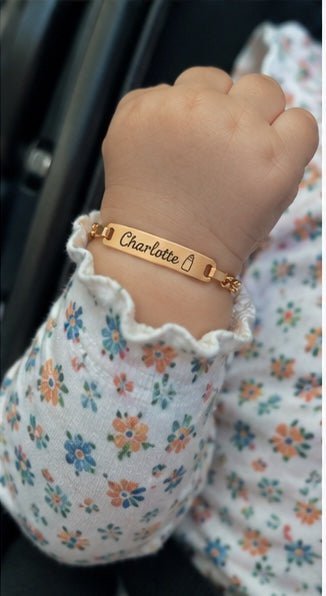 Baby wrist wearing Charlotte personalized bracelet