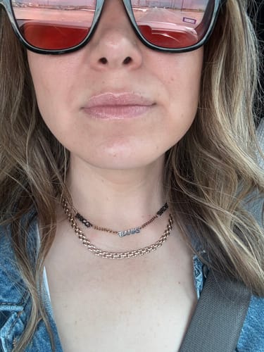 Customer wearing name necklace from Jewelry Handcrafts
