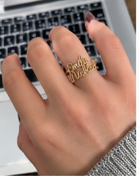 Customer wearing two name ring in car lifestyle photo