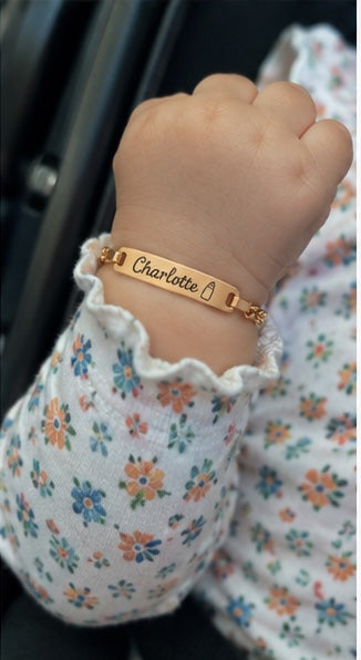 Baby wrist wearing Charlotte personalized bracelet